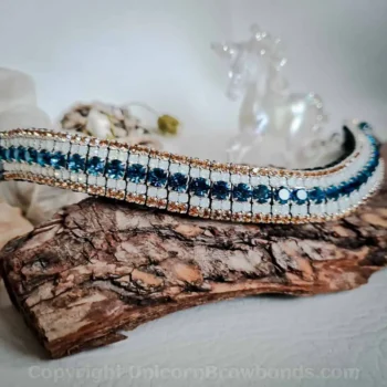 Curved Capri Blue Crystal Browband with White Opal and Light Colorado Gold Preciosa Maxima crystals, perfect for dressage and showjumping horses